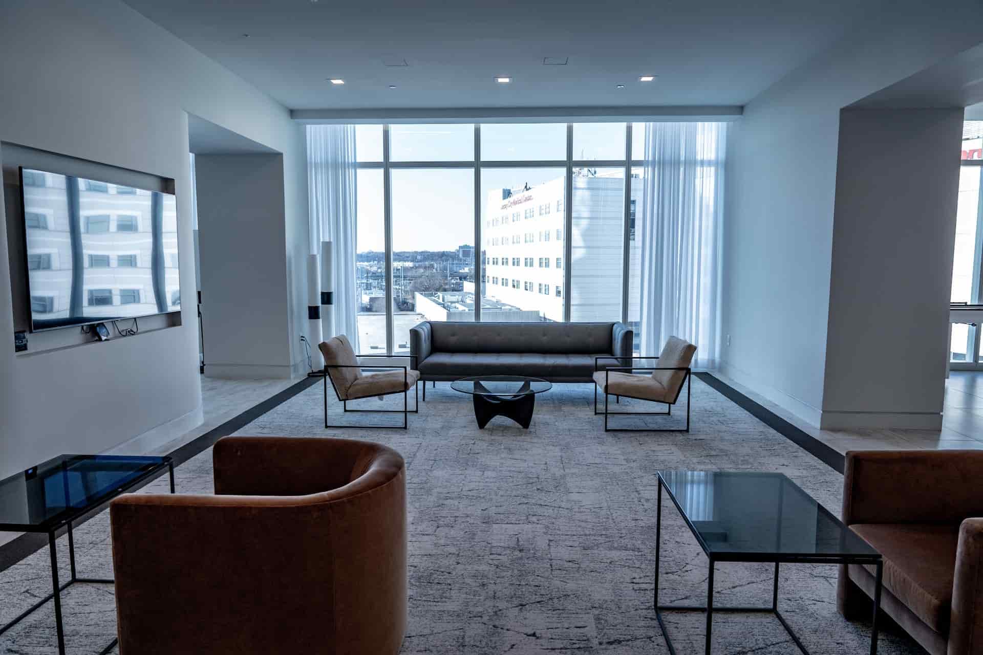 Office space with couch and chairs.