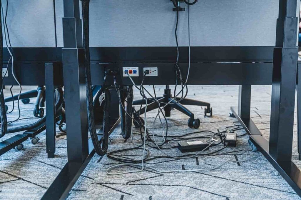 Office chords under the desk.